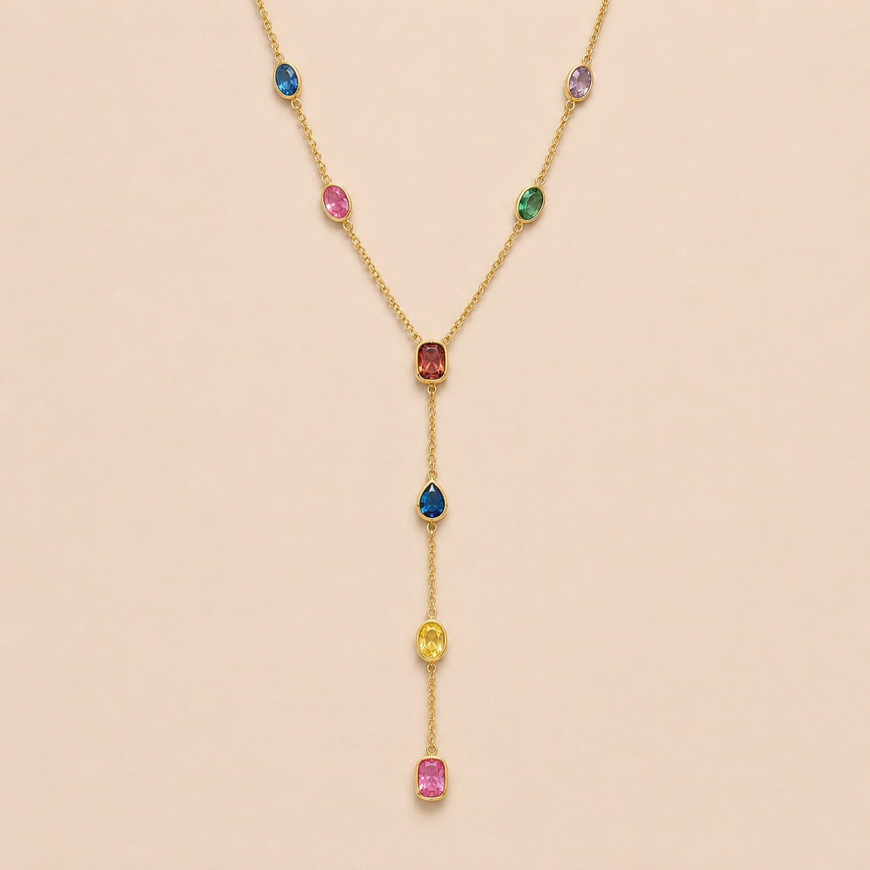 Gold Calma Y NECKLACE with multicolor gemstone stations in blue, pink, purple and green, drawn into a long lariat drop.