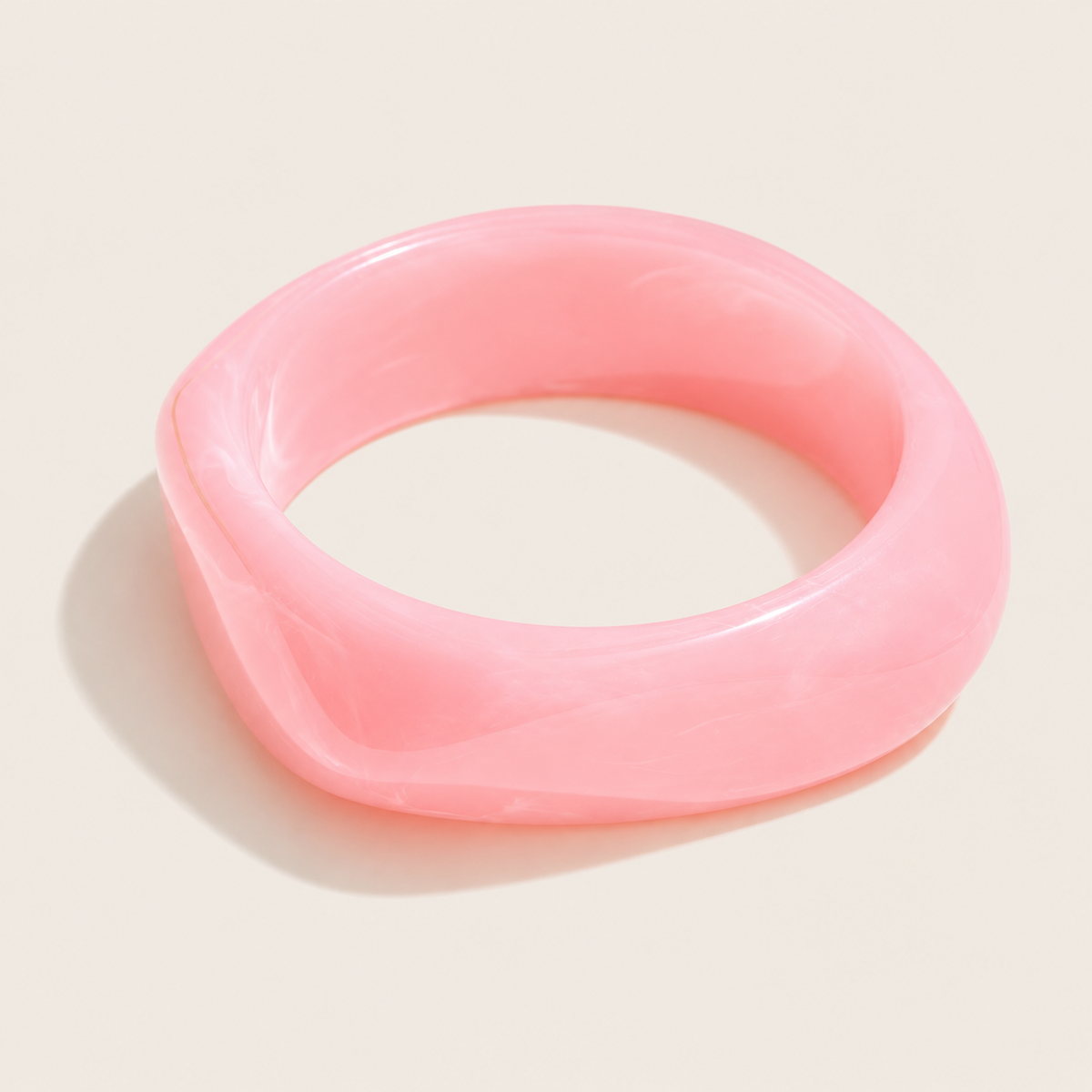 Coastal Escape BRACELET in pink glossy resin, a chunky angular bangle shown alone on a cream background.