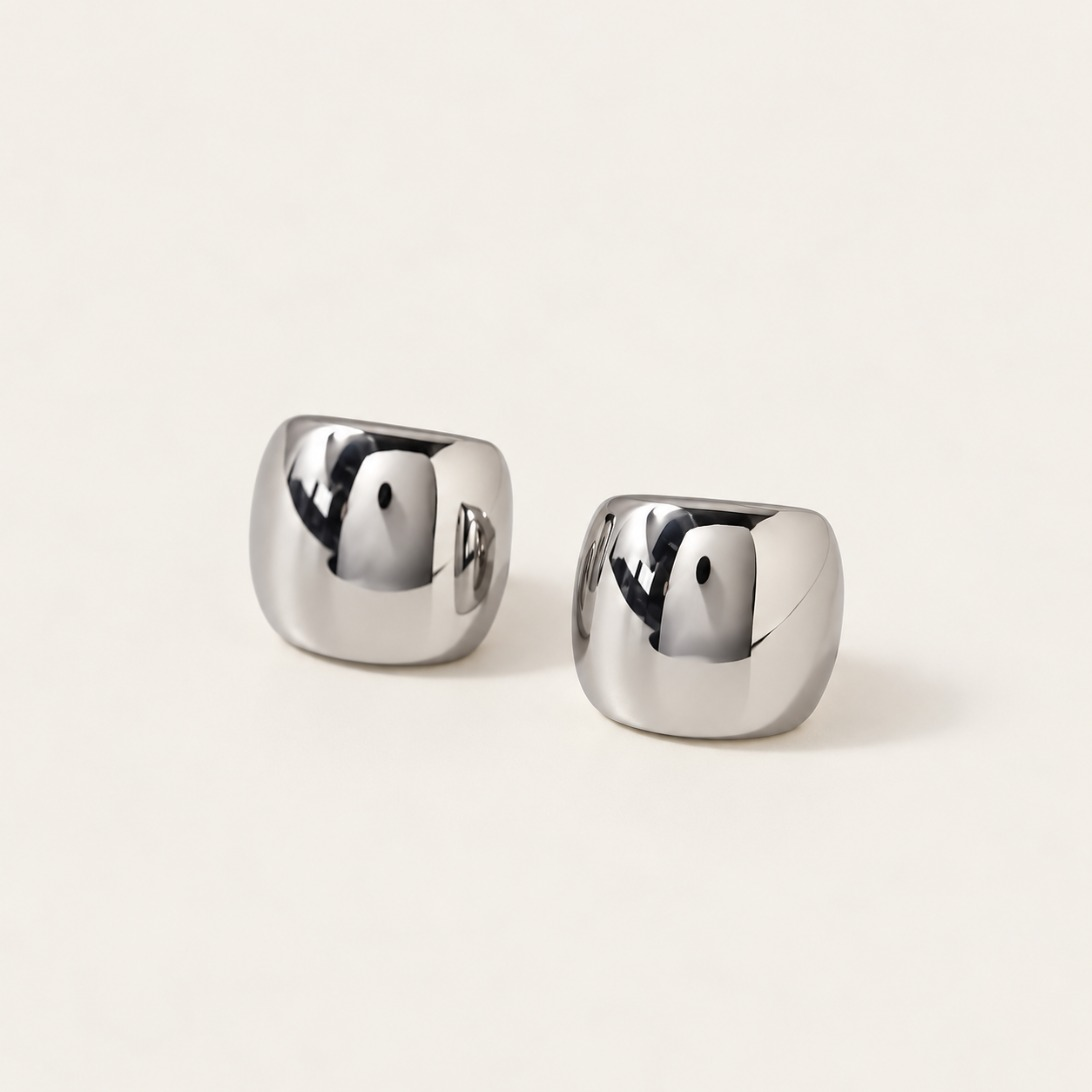 Silver-tone Dôme EAR CUFF: a pair of chunky, high-shine domed cuffs with a rounded square shape — Folie à Trois