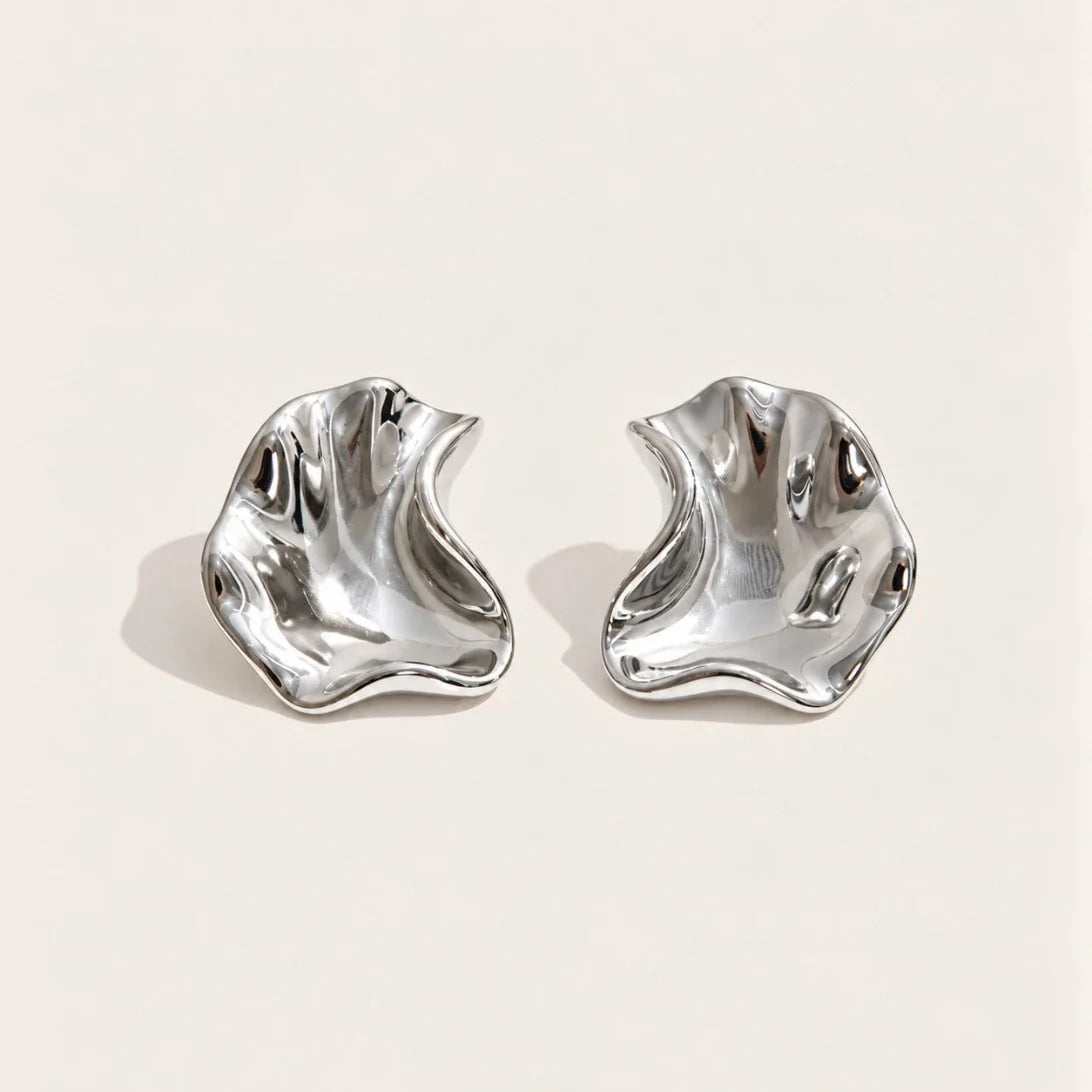 Silver-tone Fondu EARRINGS: a pair of irregular, wavy stud earrings with a high-shine molten-metal finish — Folie à Trois