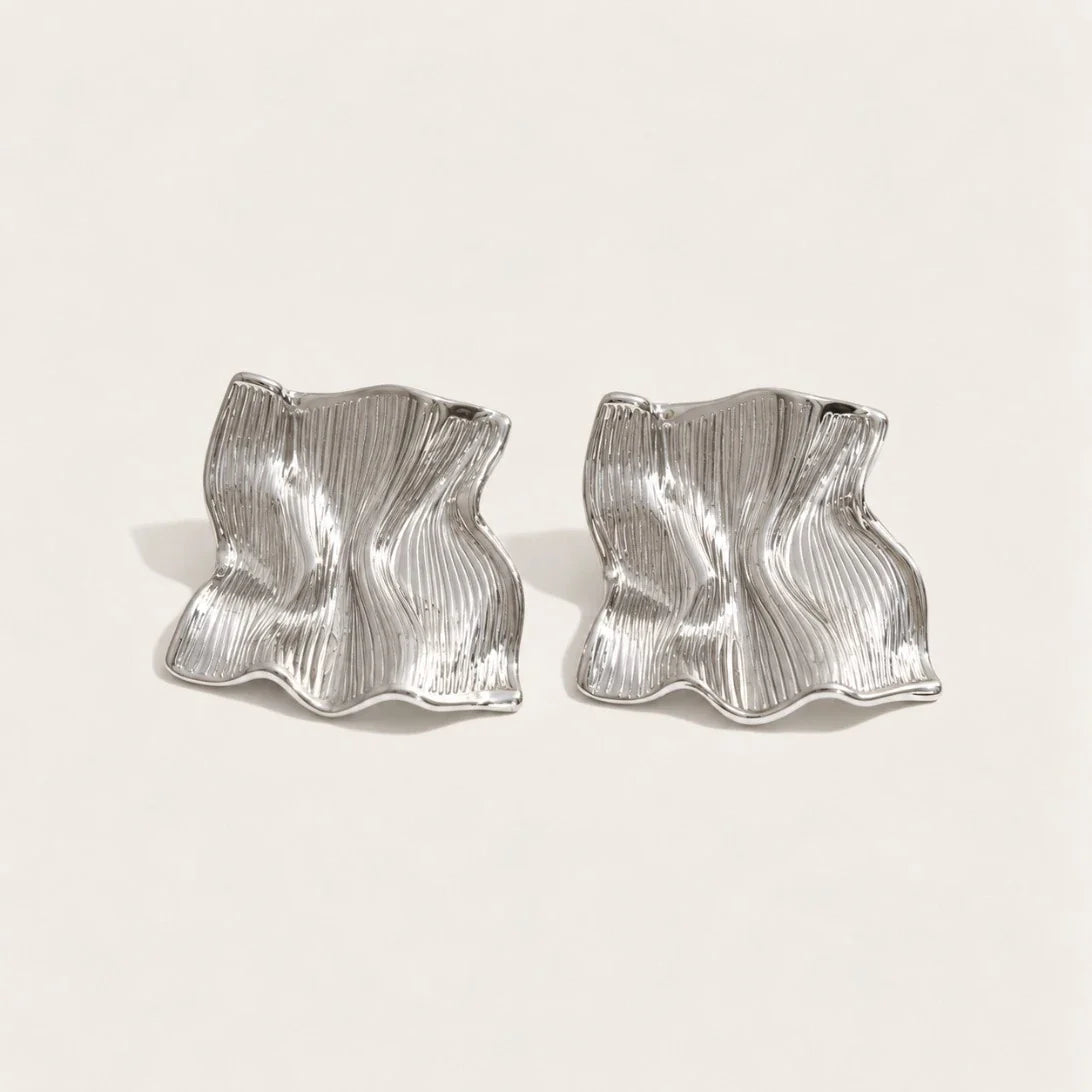 Silver-tone Froissé EARRINGS: a pair of chunky square earrings with a softly crumpled, textured surface — Folie à Trois