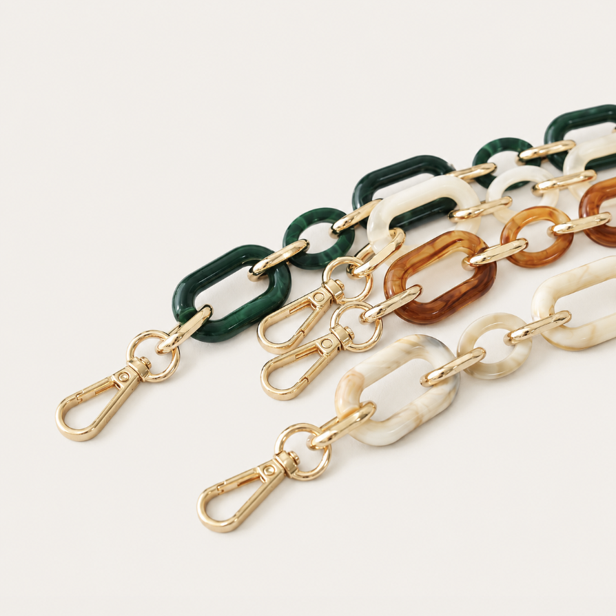 Hazel Phone Chain close-up, luxury packshot on beige background