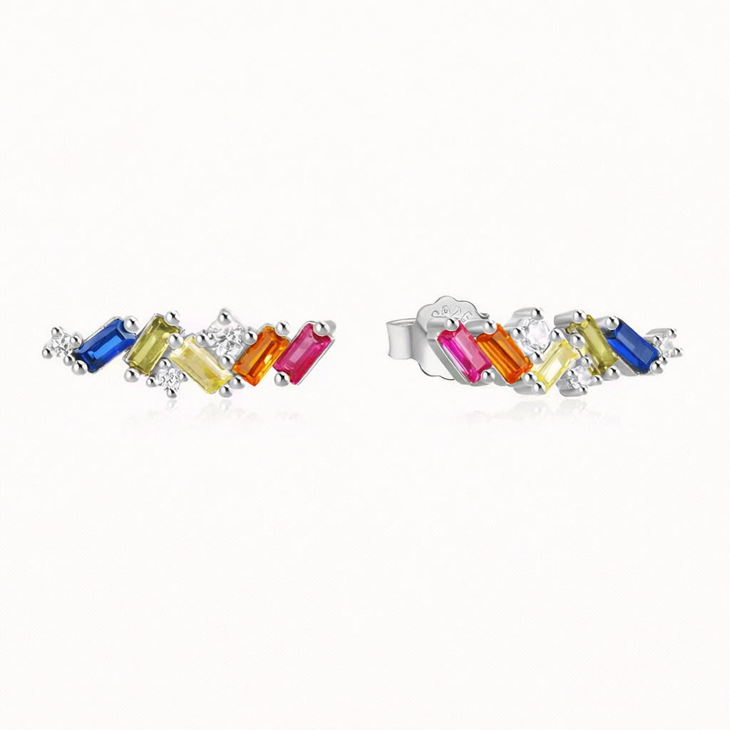 Ma Cherie Earrings cluster multicolor baguette and round stones in an asymmetric climber along the silver setting.
