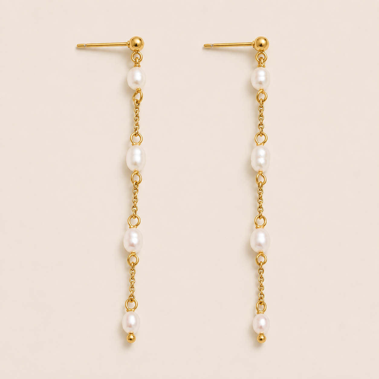 Long gold chain drop earring with four pearls spaced along a delicate link — Folie à Trois Perla Luna EARRINGS.