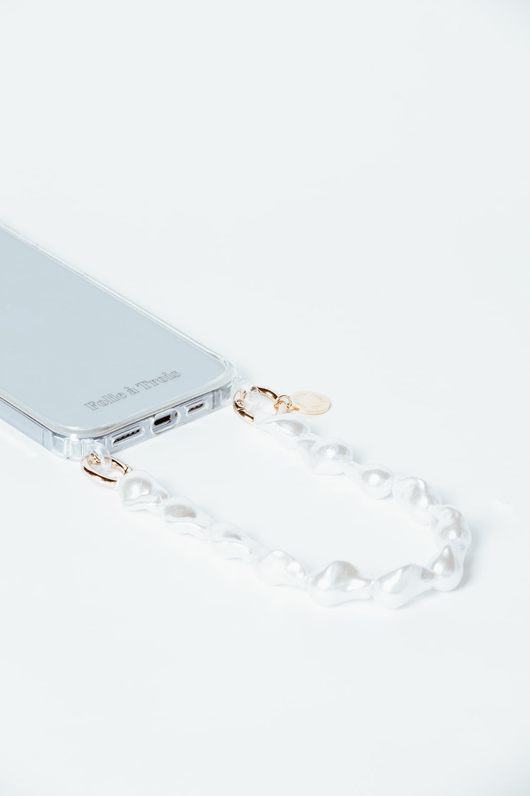 Clear phone case with a short white baroque pearl phone strap and gold clasps, from the Phone Case + Short phone strap BUNDLE.