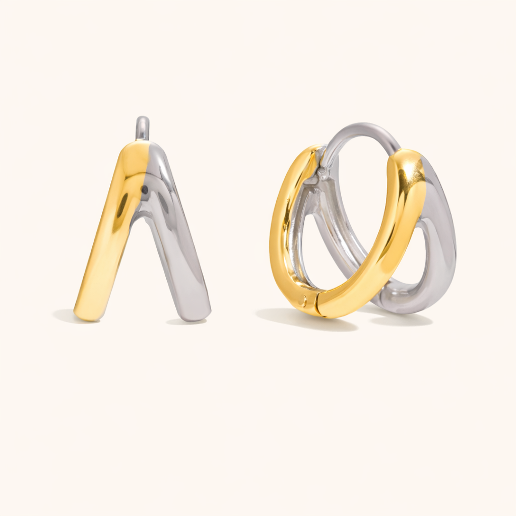 Roadtrip Earrings in mixed gold and silver, a triangular stud and a double-band huggie hoop, shown from front and side.