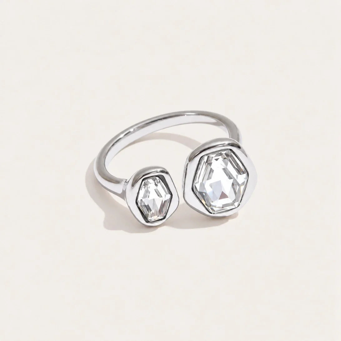 Silver-tone Roche RING: an irregular, sculpted open band wrapped around a round white zirconia — Folie à Trois