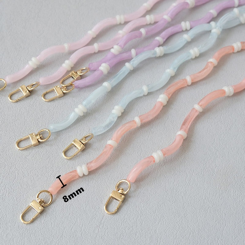 Smooth Moves PHONE CHAIN shown in pink, lavender, blue, and coral tube-bead colorways with gold clasps and an 8mm size label.