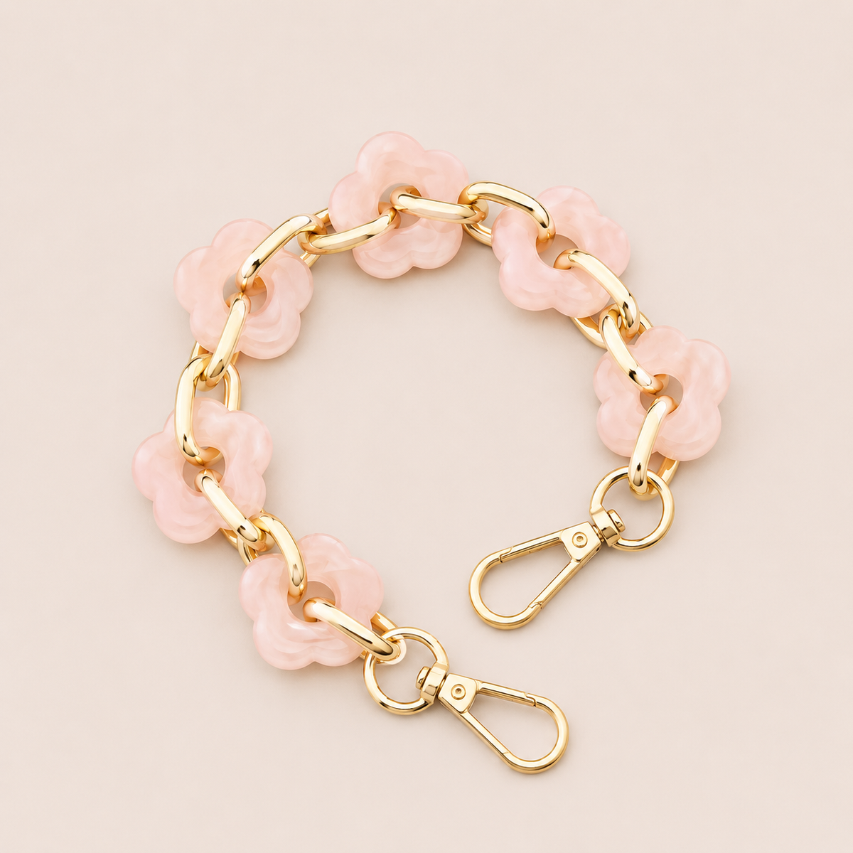Round flower-link phone chain in blush pink acrylic with gold chain links — Folie à Trois Zinnia short phone chain