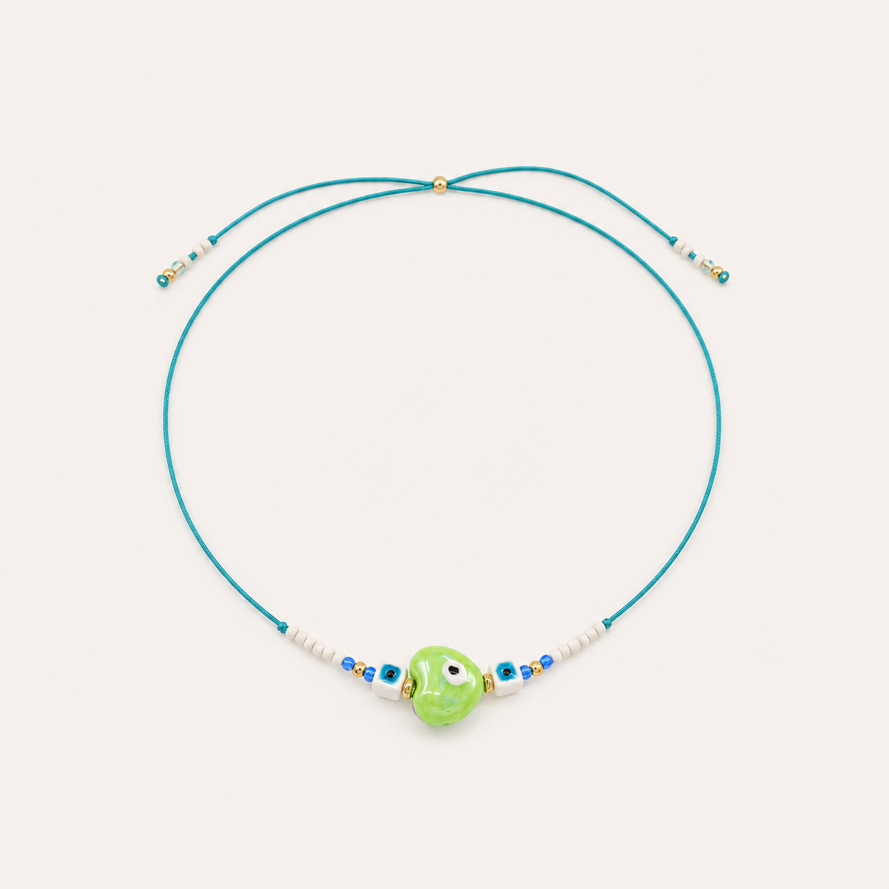 Heart Eye Necklace – Green Ceramic Bead, by Folie à Trois
