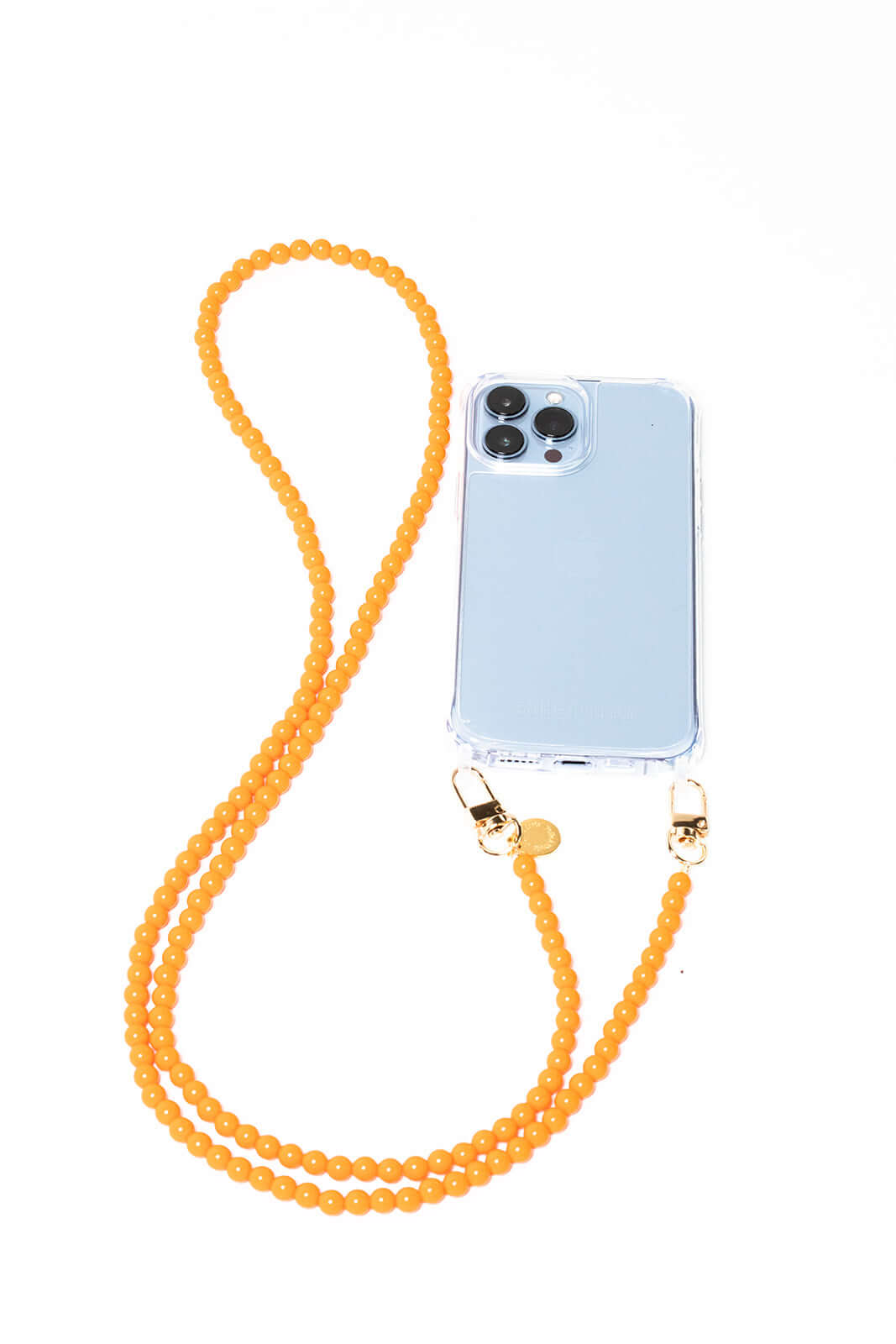 Amber-orange beaded Aurora PHONE CORD attached to a light blue phone case on a white background.