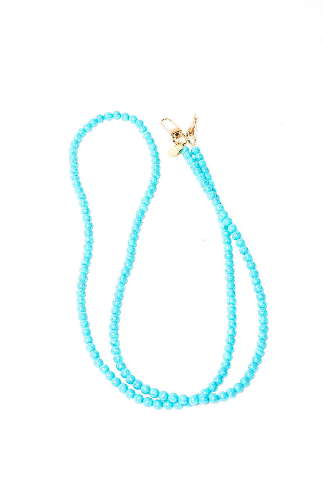 Turquoise beaded Aurora PHONE CORD looped on a white background with gold-tone clasps.