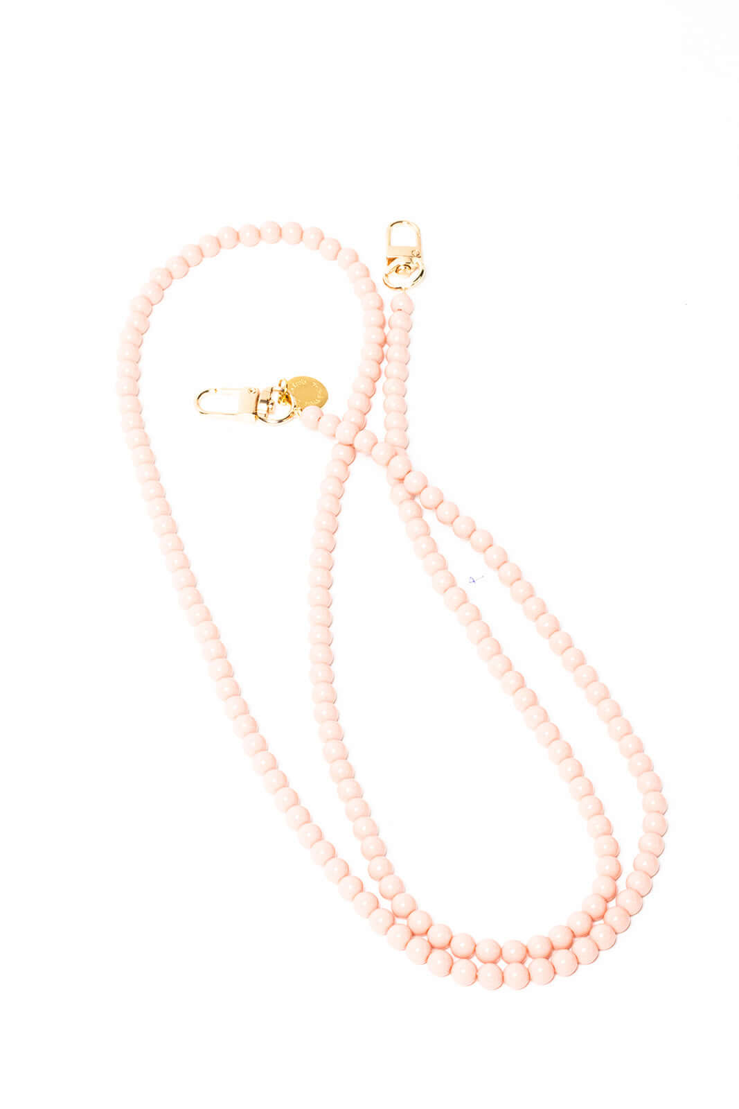 Light pink beaded Aurora PHONE CORD strand shown looped on a plain white background.