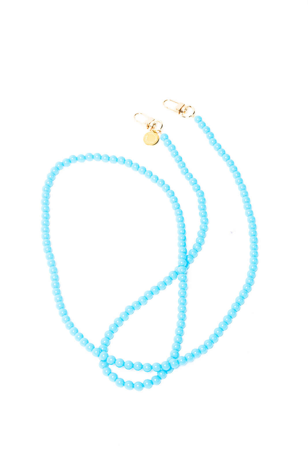 Turquoise beaded Aurora PHONE CORD looped on a white background with gold-tone clasps.
