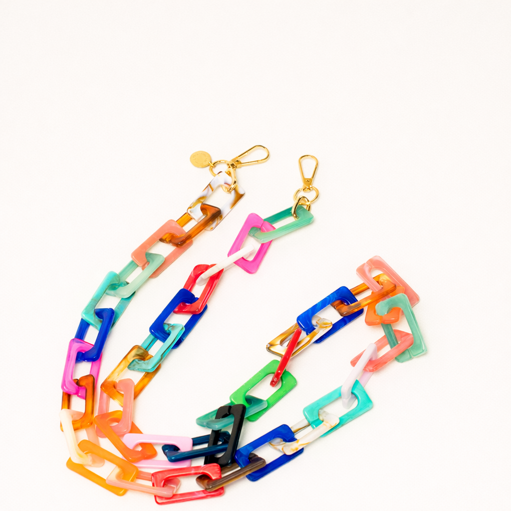 Rainbow multicolor acrylic chain-link Bennie long phone chain coiled flat with gold clasps.