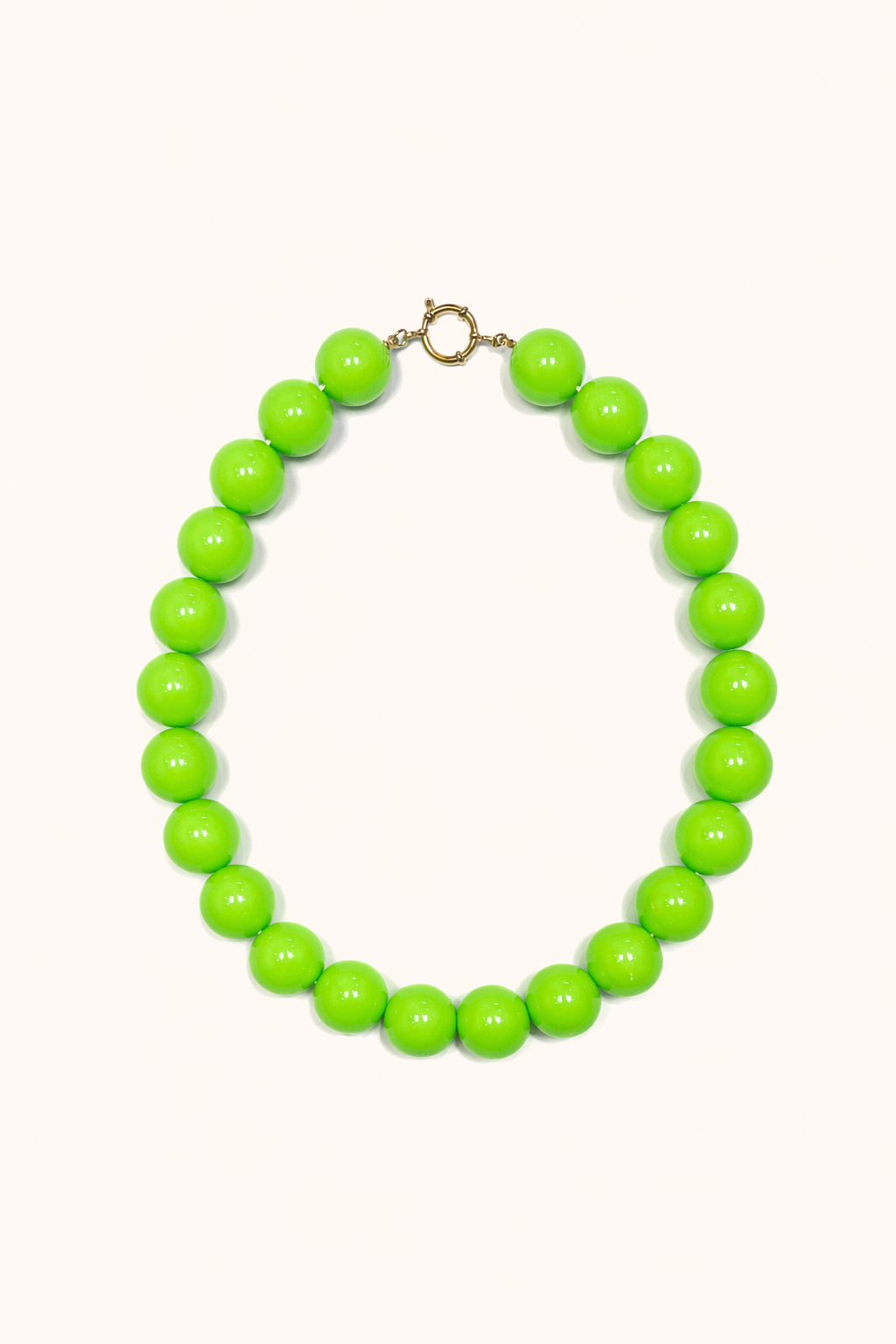 The Blaire NECKLACE in lime green, a single strand of large glossy round beads with a gold ring clasp, shown flat.
