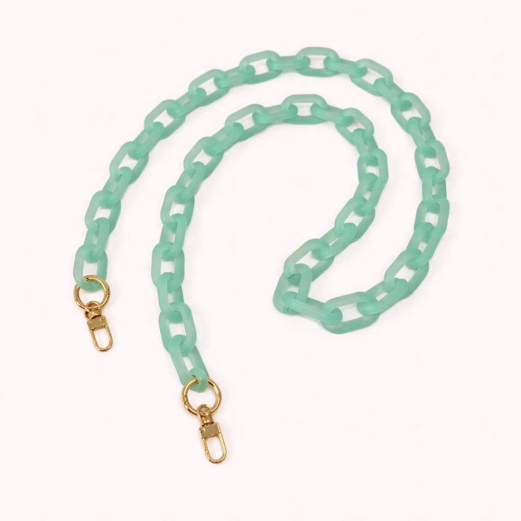 Mint green frosted acrylic Bubble Links phone chain coiled flat with gold-tone clasp hardware.