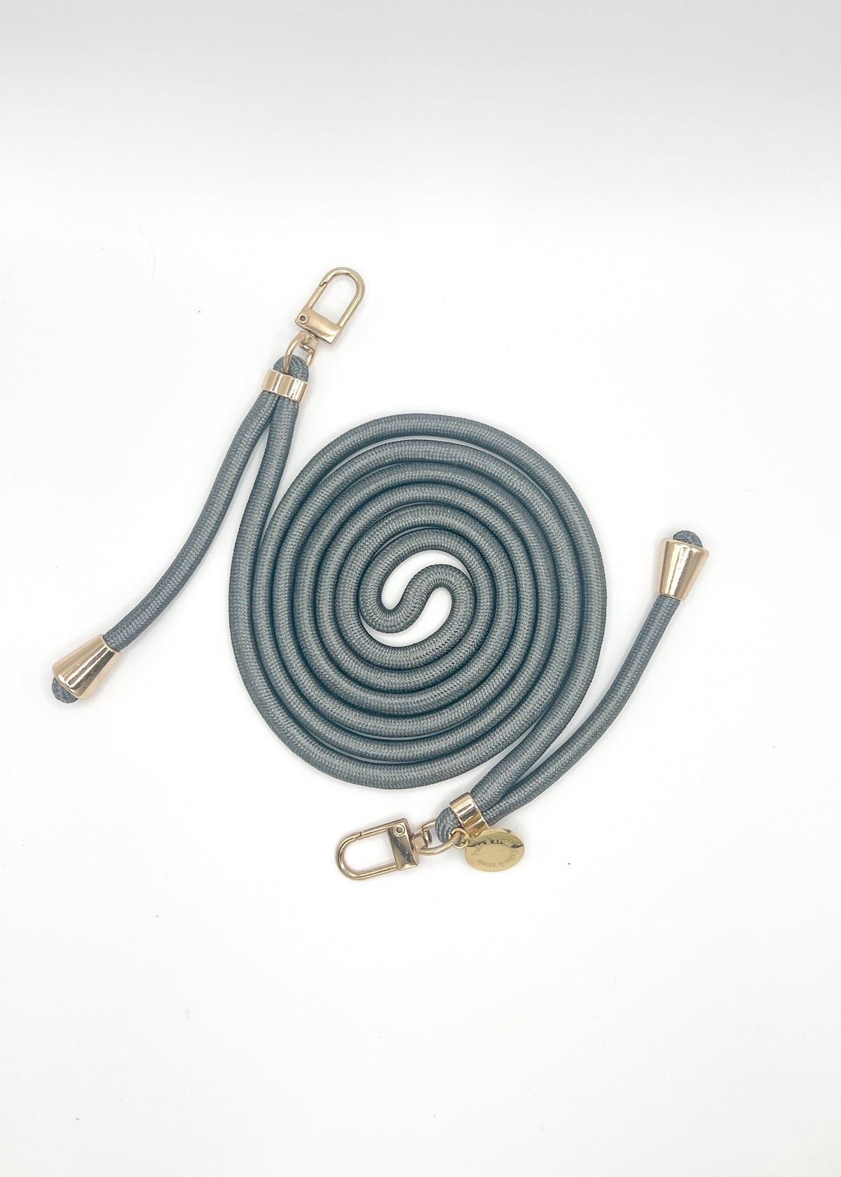 Gray-blue Colorful PHONE CORD coiled with gold-tone hardware on a white background.