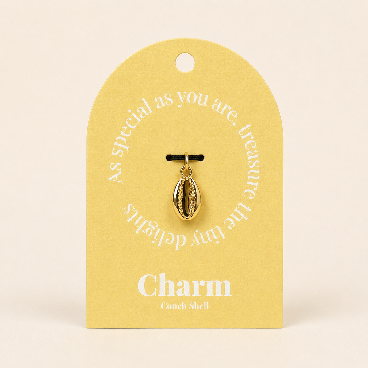 The Conch Shell CHARM displayed on a yellow Charm gift tag, hanging from a black cord against the card text As special as you are.