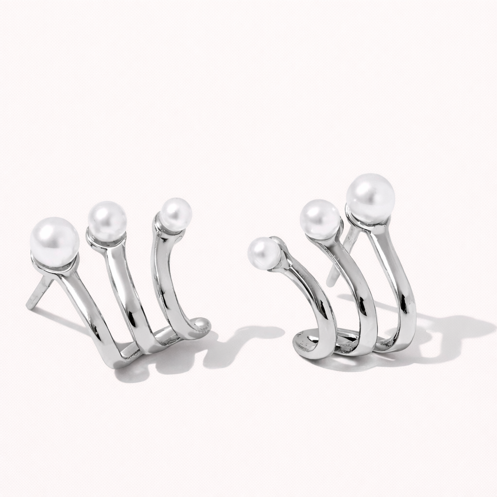 Effie Earrings in a silver-tone finish, showing the same three-prong pearl-tipped design from the front.