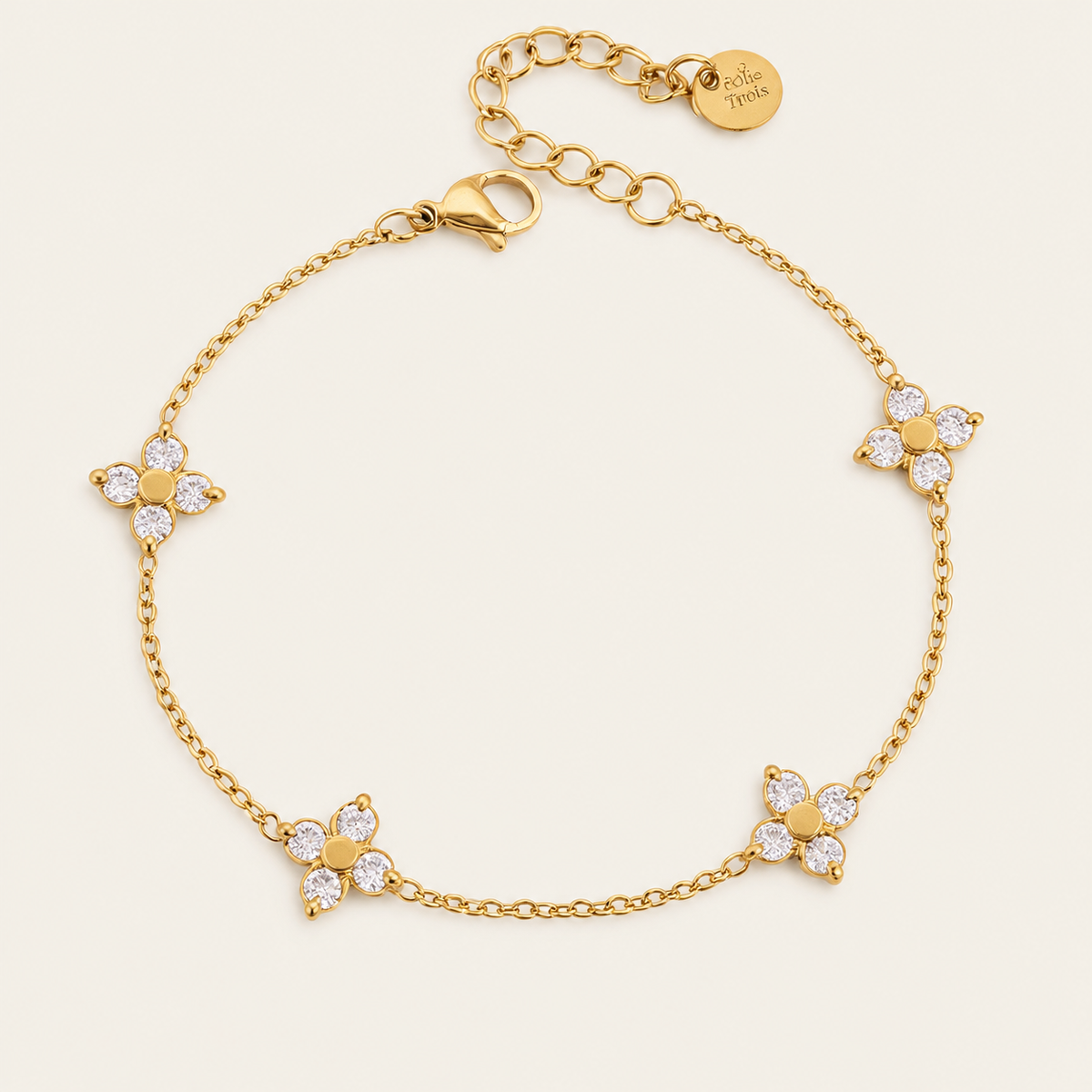 Gold Fiore BRACELET: fine chain with four zirconia flower stations and an extender chain — Folie à Trois wholesale