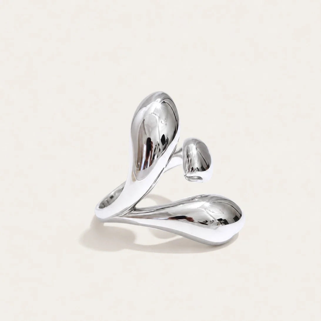 Silver-tone Gemelli RING: an open band with two polished drops rising side by side — Folie à Trois