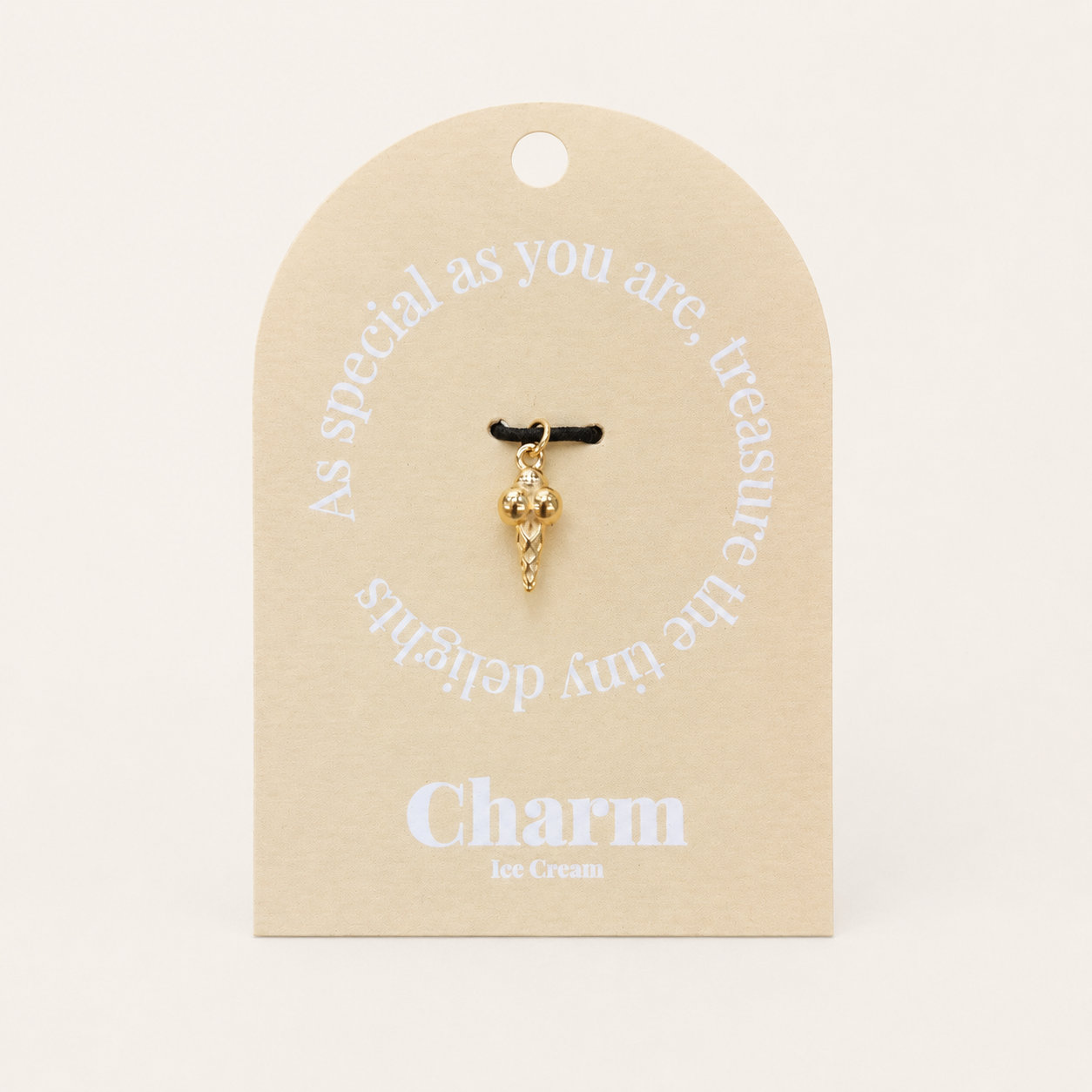 The Ice Cream CHARM displayed on a beige Charm gift tag, hanging from a black cord against the card's As special as you are text.