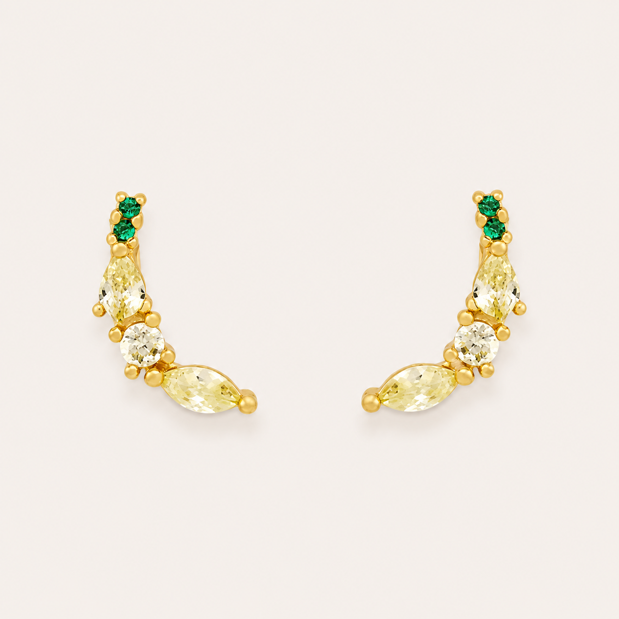 Gold ear-climber stud earrings from the Little Fruit EARRINGS with yellow marquise cubic zirconia, a round white stone, and a green accent.