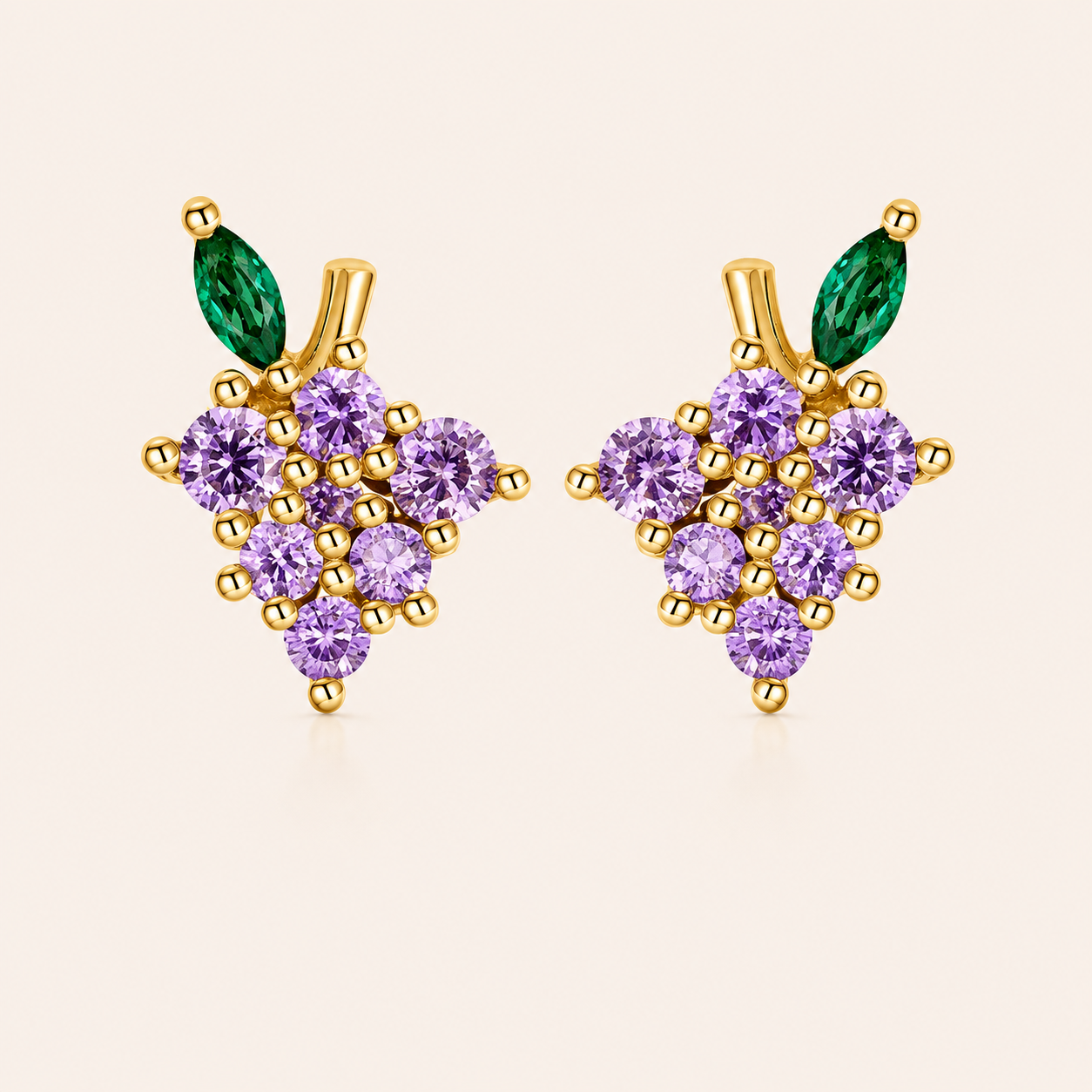 Gold grape-cluster stud earrings from the Little Fruit EARRINGS with purple round cubic zirconia stones and a green marquise leaf.