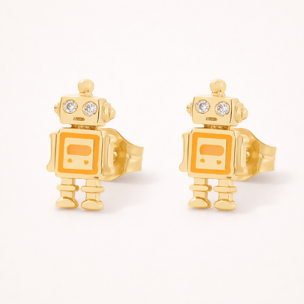 Little Robot Earrings appear here in orange enamel, their gold robot body topped with sparkling stone eyes.