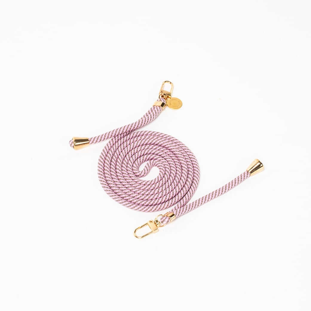 Mauve and white striped Multi Colorful PHONE CORD coiled with gold-tone hardware on a white background.