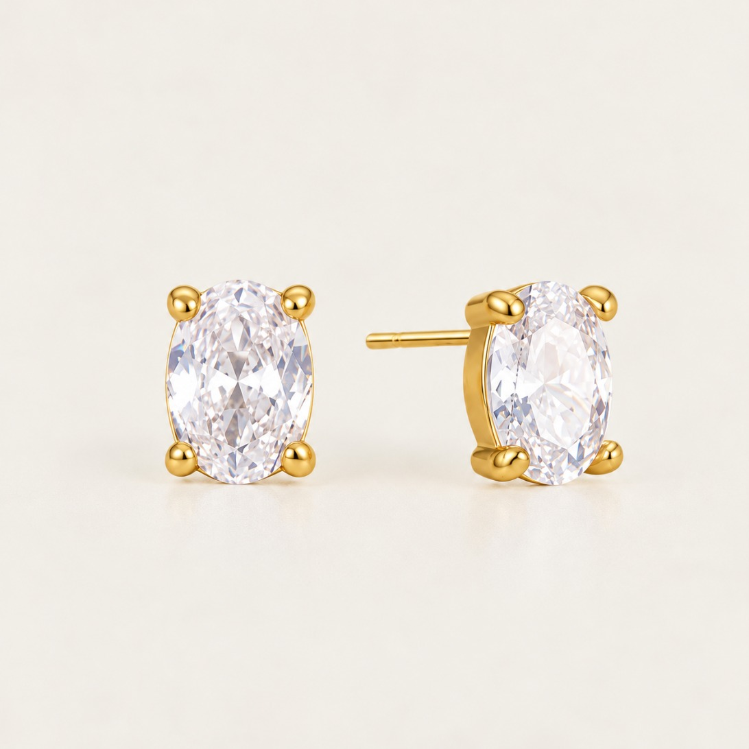 Gold Ovalie EARRINGS: oval-cut white zirconia studs in a four-prong gold setting — Folie à Trois