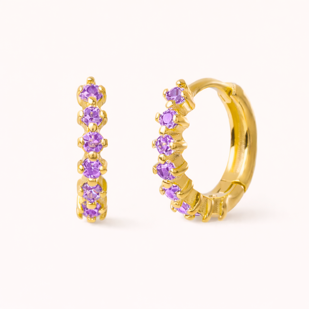 Retro Filter Earrings in gold with lilac-purple crystals, the huggie hoop set with five graduated round stones.