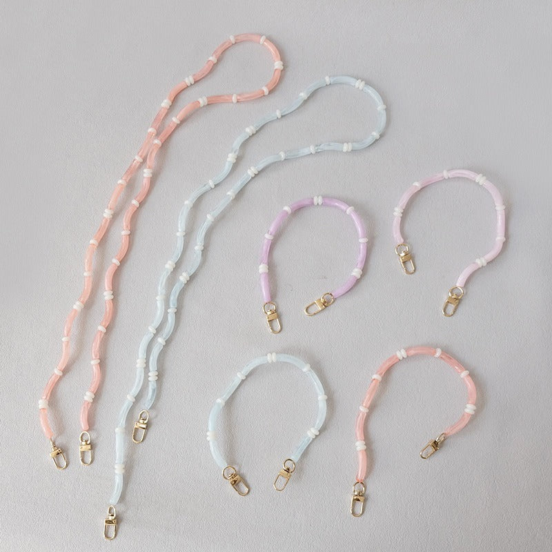 Six Smooth Moves PHONE CHAIN bracelet-length segments in pink, blue, lavender, and coral tube-bead colorways.