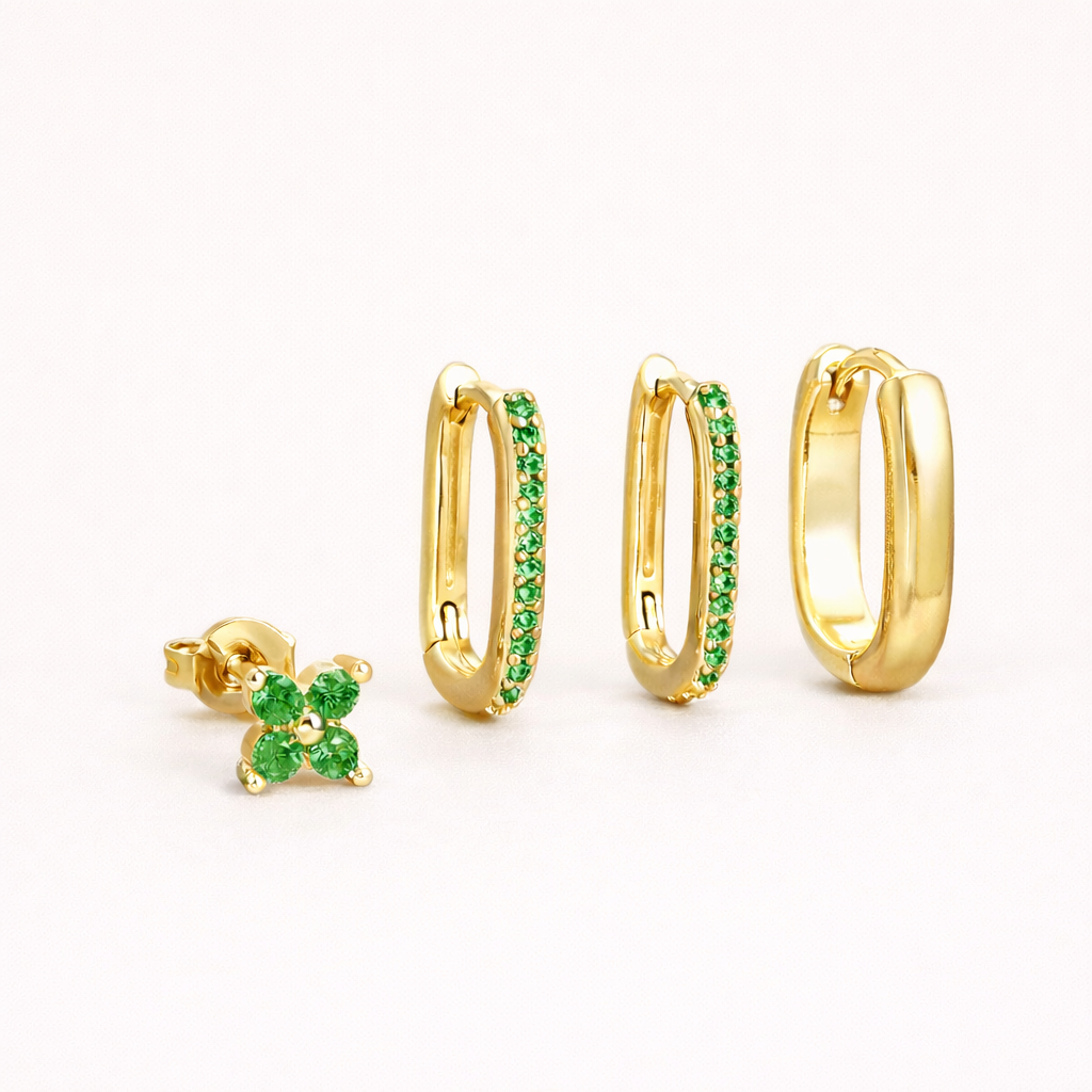 Sophia Set in gold with green crystal accents, showing the clover stud and crystal-lined rectangular hoop trio.