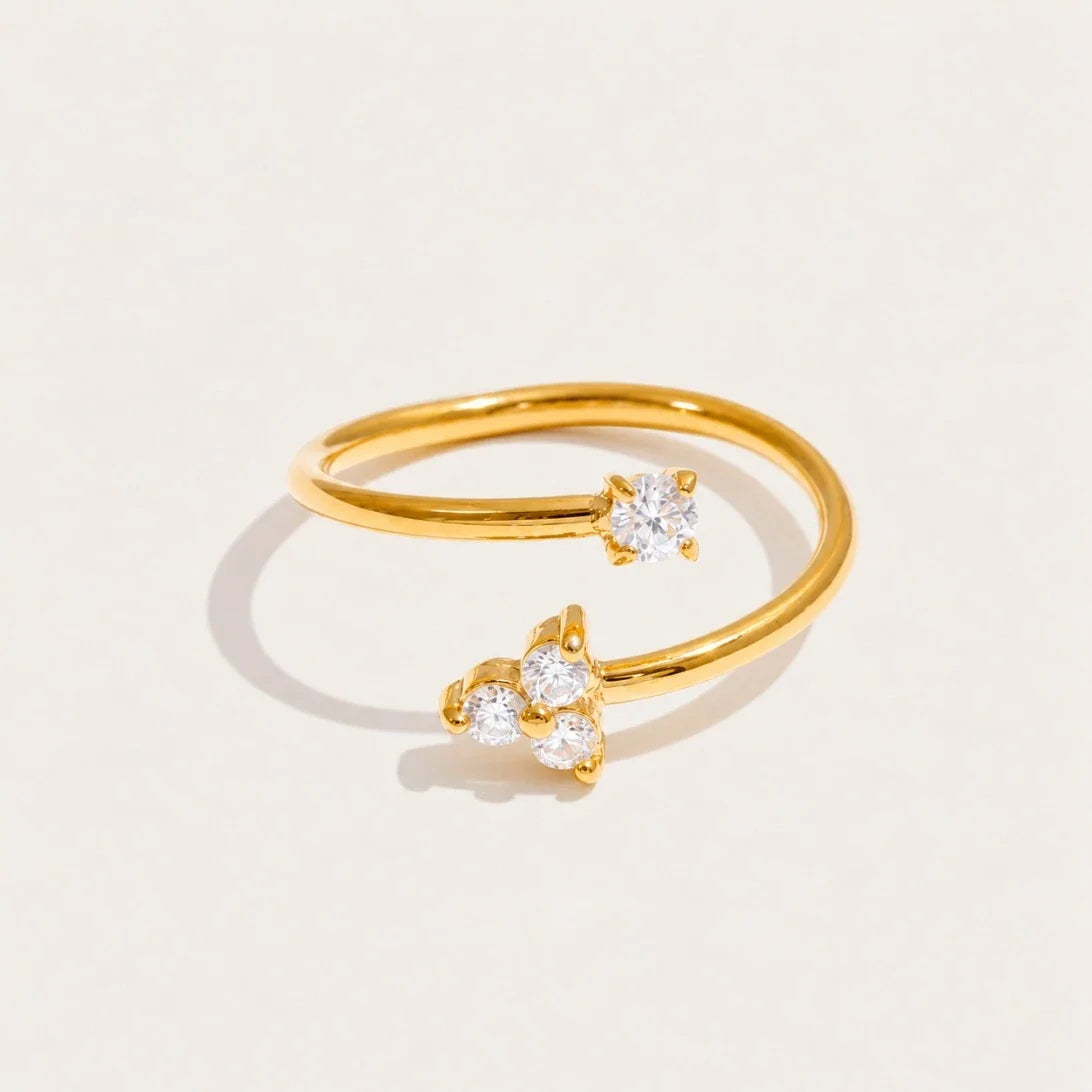 Gold Stella RING: a fine open band finished with a small sparkling white zirconia stone — Folie à Trois