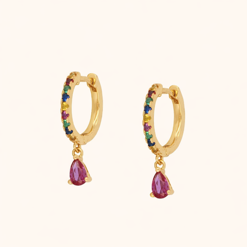 Teardrop Earrings in gold with rainbow multicolor crystals, the hoop dropping a single ruby-pink pear stone.