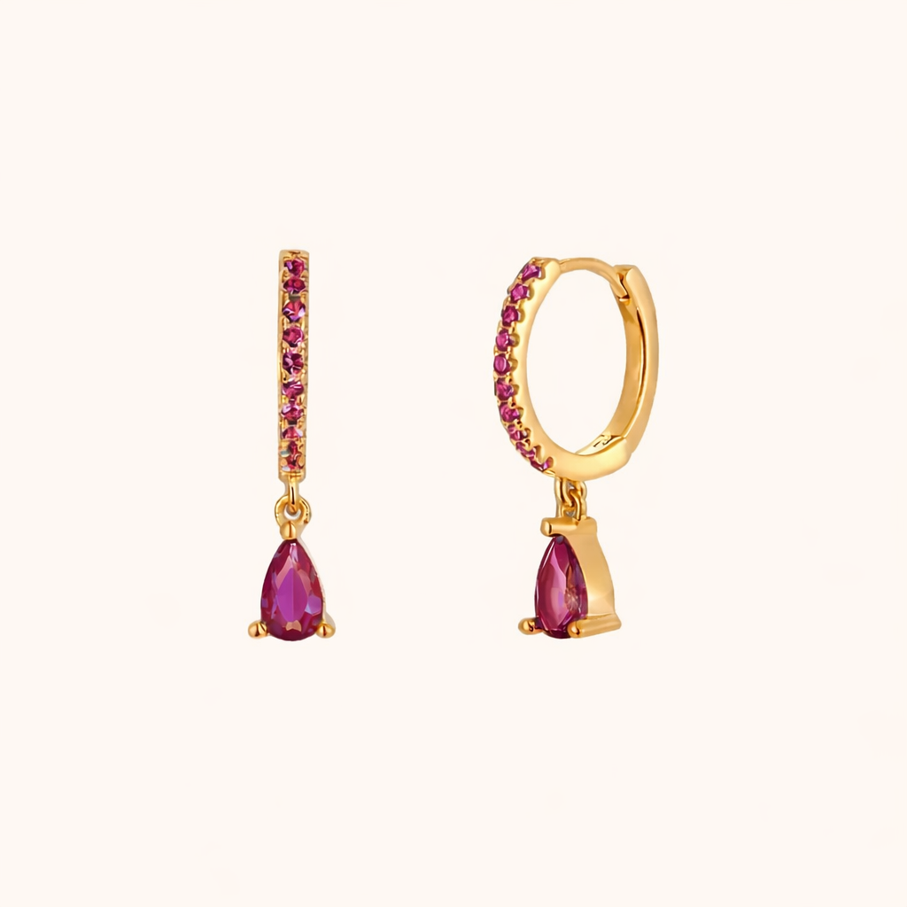 Teardrop Earrings in gold with fuchsia-pink crystals, the pave hoop dropping a single pear-cut pink stone.