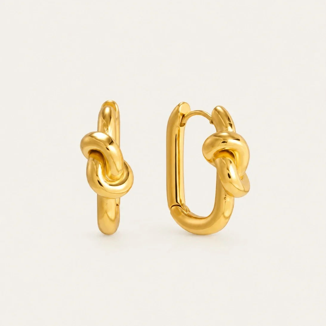 Gold Twine EARRINGS: rectangular huggie hoops with a sculpted knot detail, one shown open — Folie à Trois