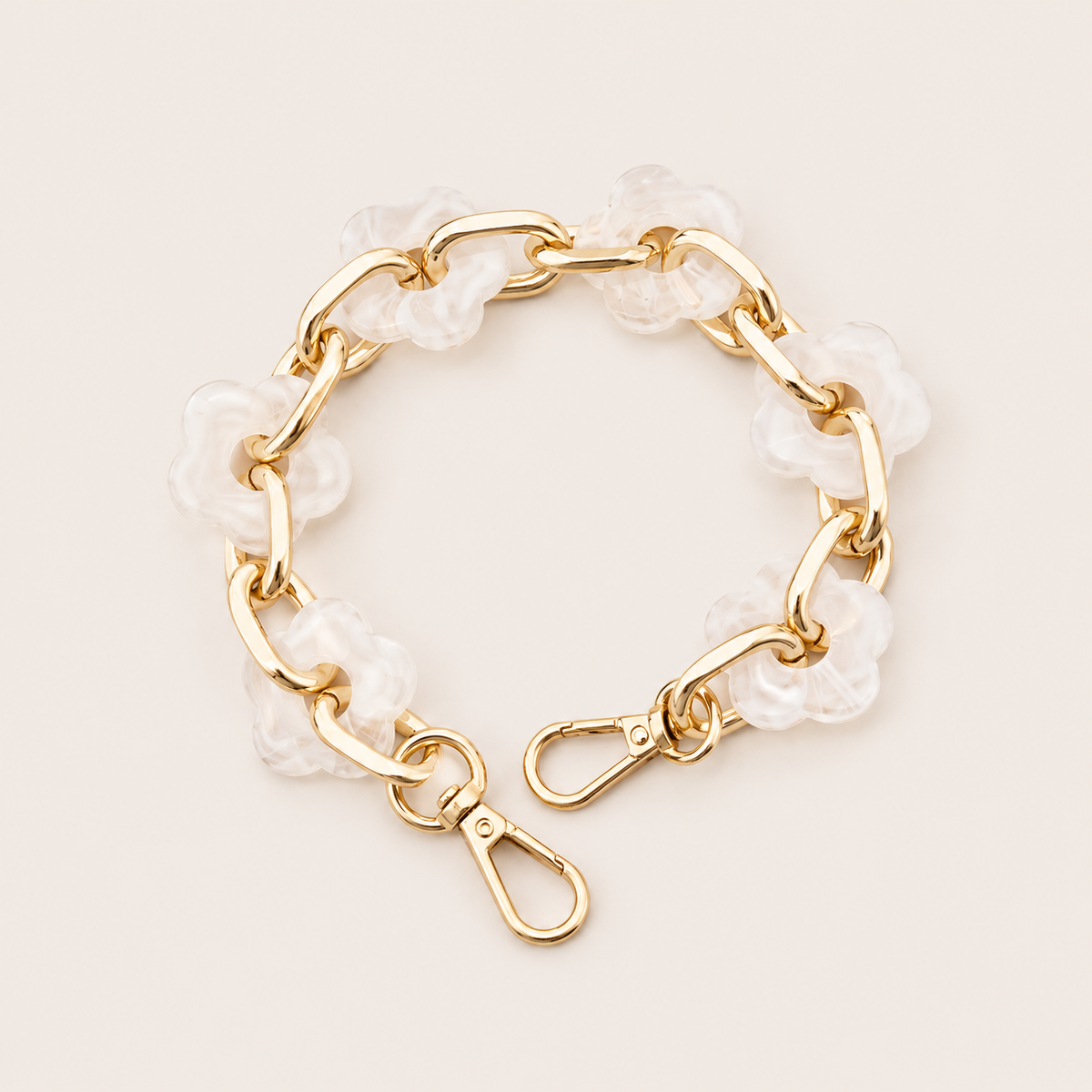 Round flower-link phone chain in frosted white acrylic with gold chain links — Folie à Trois Zinnia short phone chain