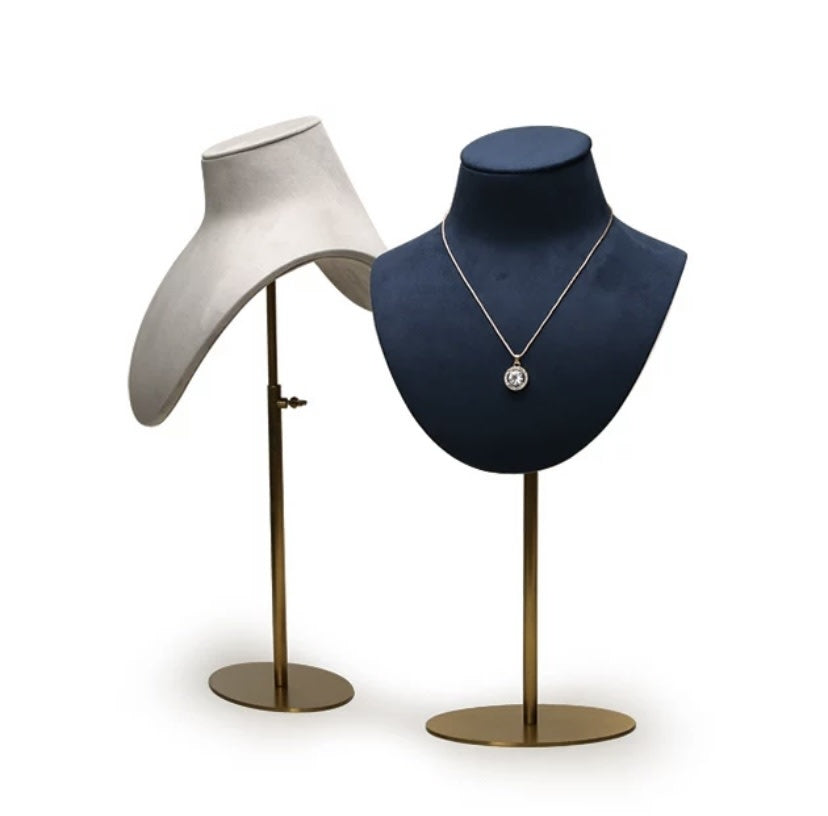 Mannequin Velvet DISPLAY busts in cream and navy velvet on brushed gold stands, the navy bust showing a pendant necklace.